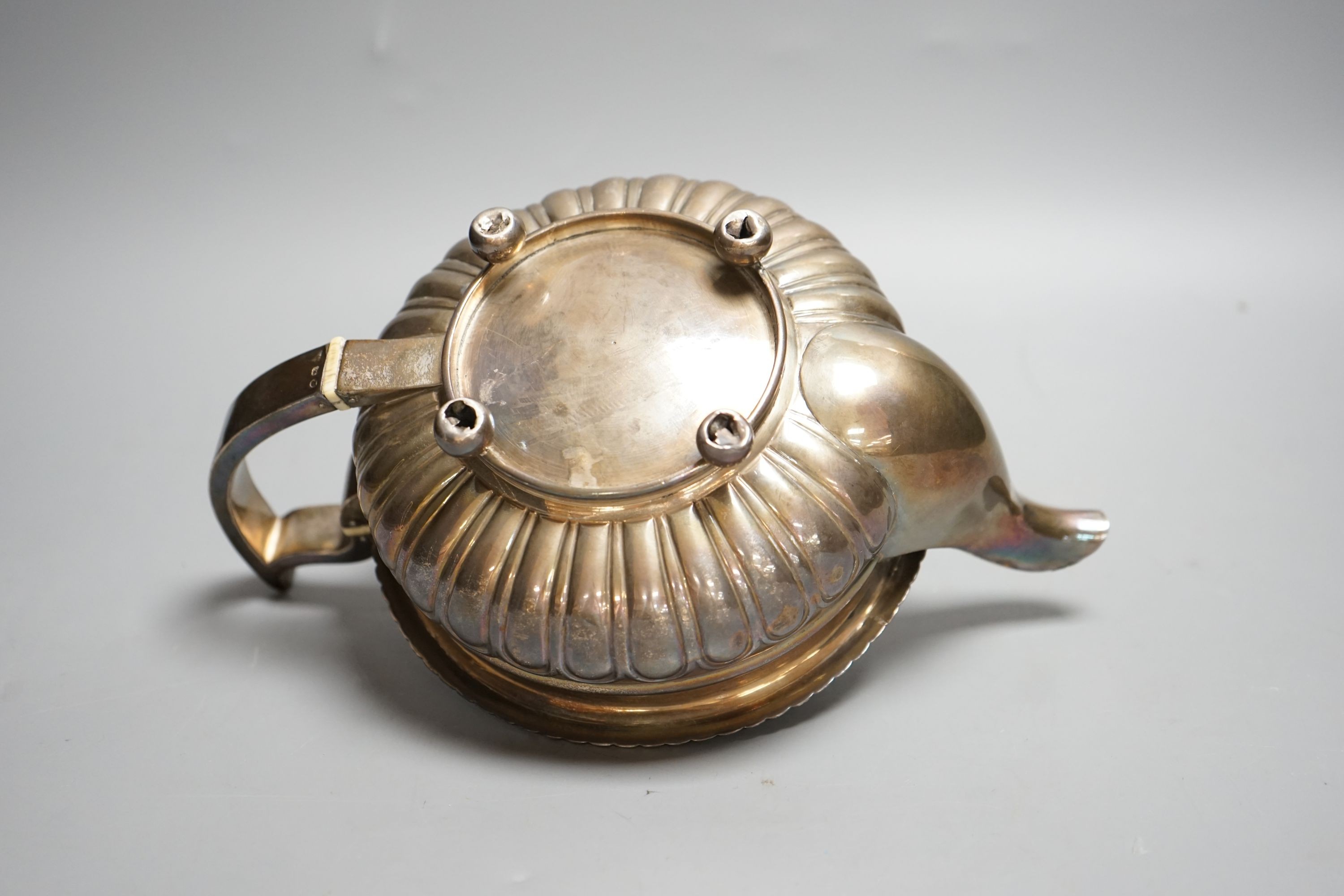 A George III silver teapot, Soloman Hougham, London, 1813, gross 23.5oz.